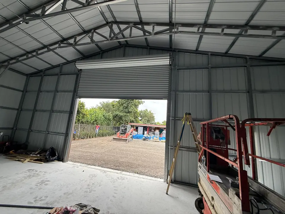 Commercial metal wall panel installation in progress
