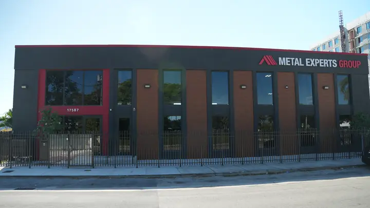 Metal Experts Group facade with wood-look and brick-look metal wall panels in Miami