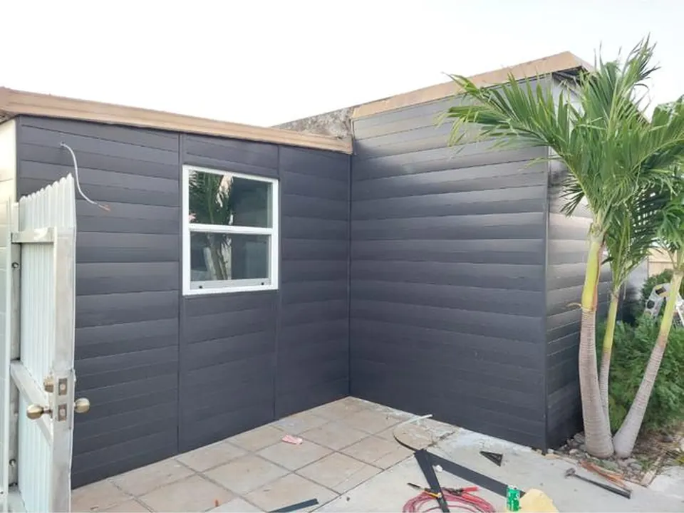 Window and door trim in horizontal metal siding