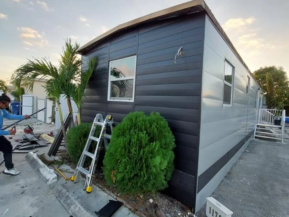Completed side elevation with clean metal siding corners