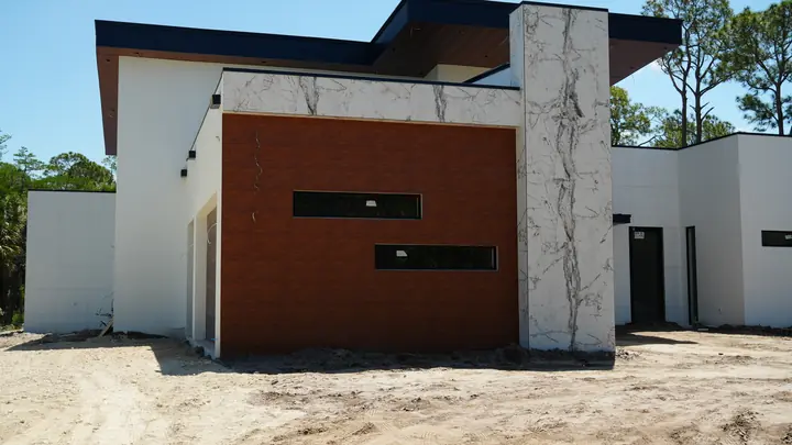 Brick-look panel wall with narrow accent windows