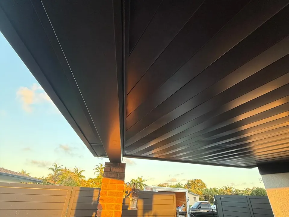 Finished dark and wood-look aluminum soffit