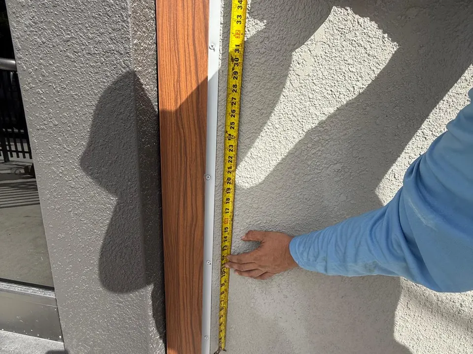 Wood-look metal trim installation detail
